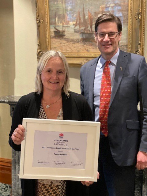 Penny Howell and Jonathan O'Dea with 2021 Woman of the Year certificate at NSW Parliament House 